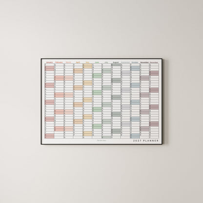 A framed 2027 annual wall planner in landscape with colour coding.