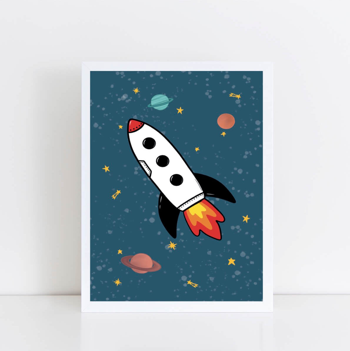 Space themed wall art of a rocket ship in space with planets and stars on a blue background.
