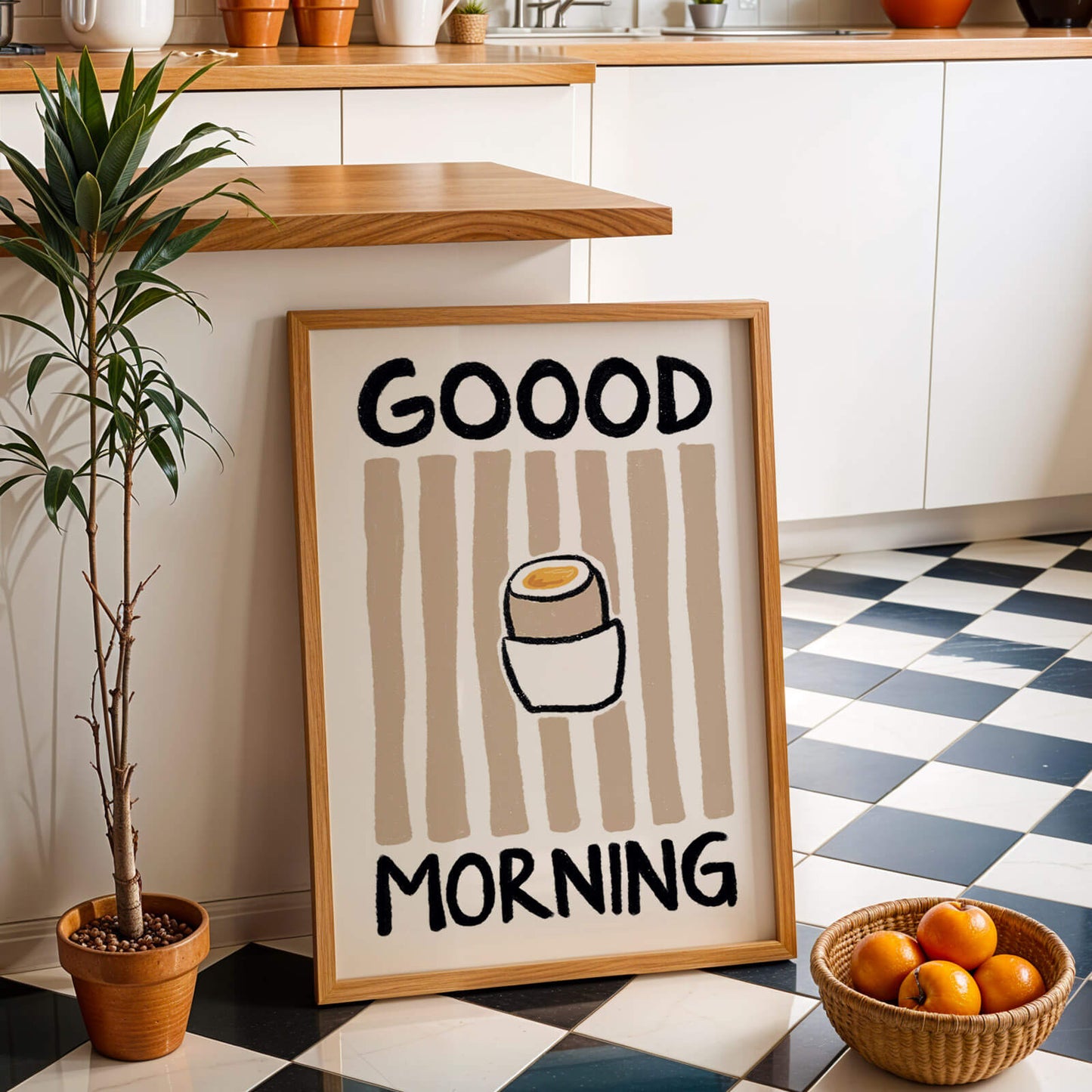 Framed breakfast print with 'GOOD MORNING' text in a kitchen setting