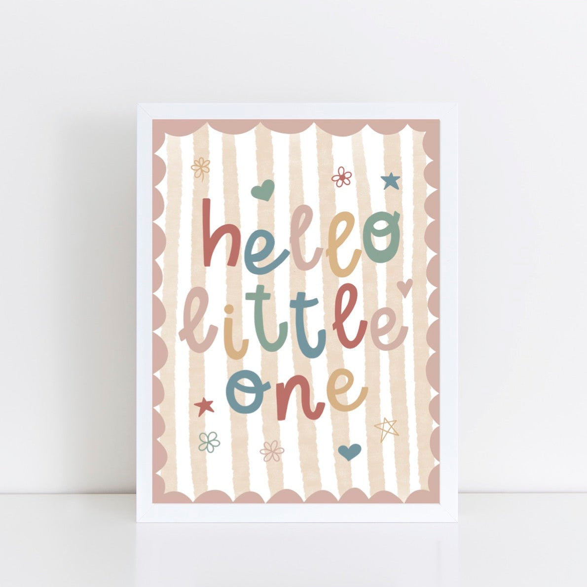 Children's nursery print with 'hello little one' text on a striped background with pink scalloped border.