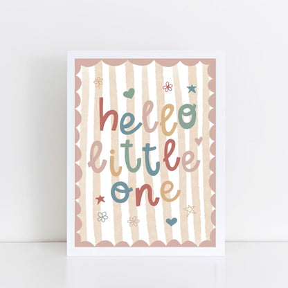 Children's nursery print with 'hello little one' text on a striped background with pink scalloped border.