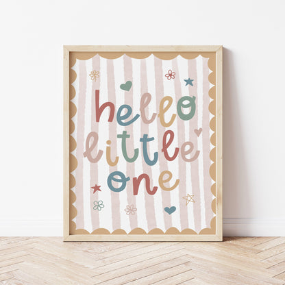 Yellow scalloped edge nursery print with a pale pink striped background. Hello little one is written in bright colours.