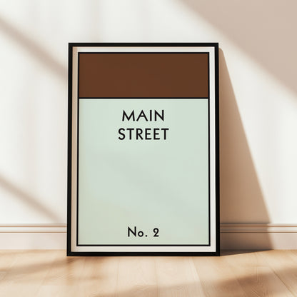 Framed artwork with 'MAIN STREET' and 'No. 2' text on a light background