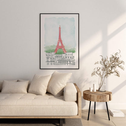Framed artwork of the Eiffel Tower on a wall above a sofa in a living room.