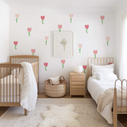 Pink flower shaped wall stickers in a beautiful, calm nursery.