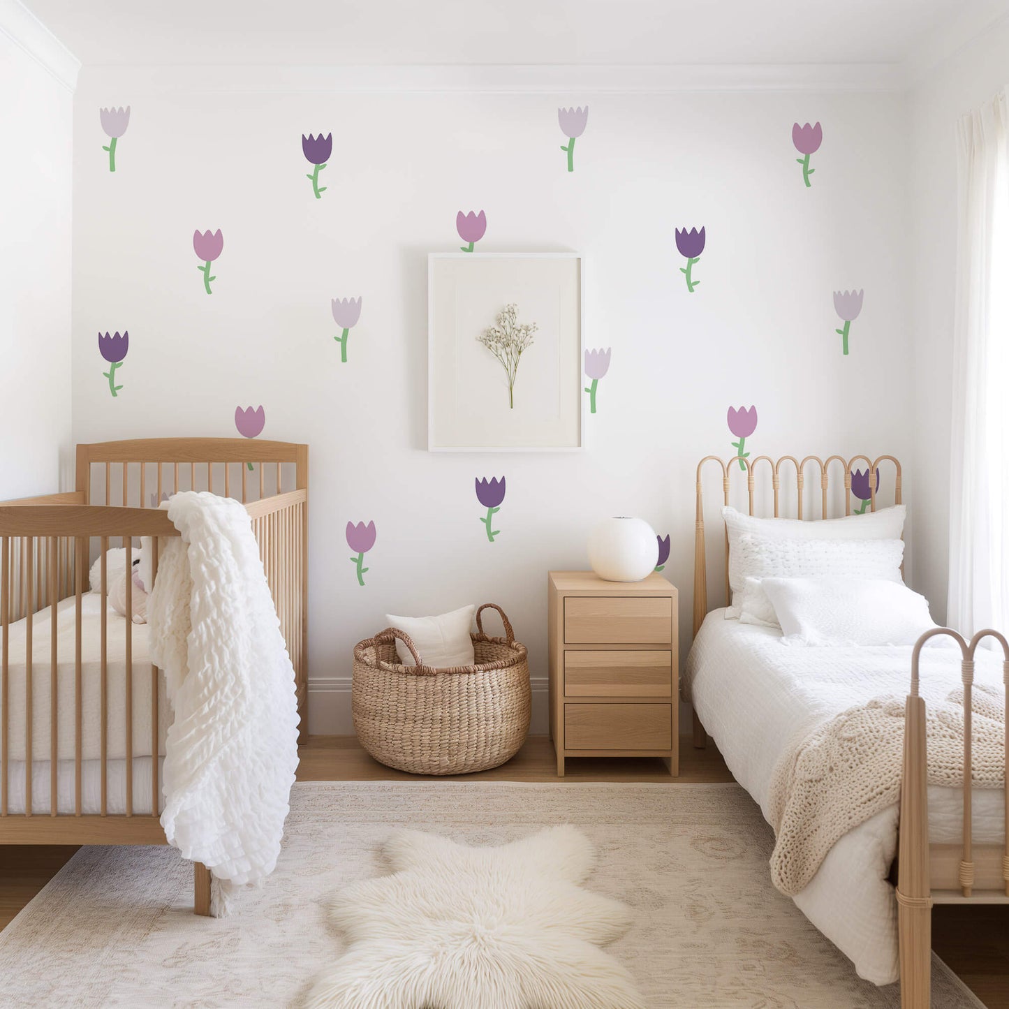 Purple tulip flower wall stickers in a gorgeous girls' bedroom. Floral wallpaper for nurseries.