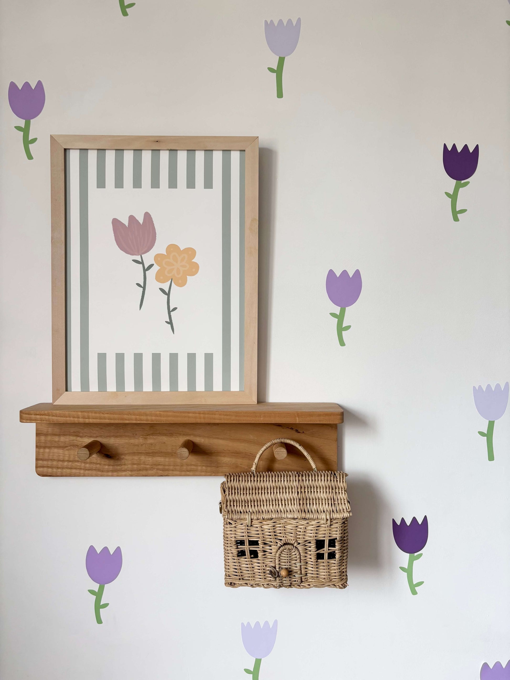 Purple tulip flower wall stickers in a gorgeous girls' bedroom. Floral wallpaper for nurseries.