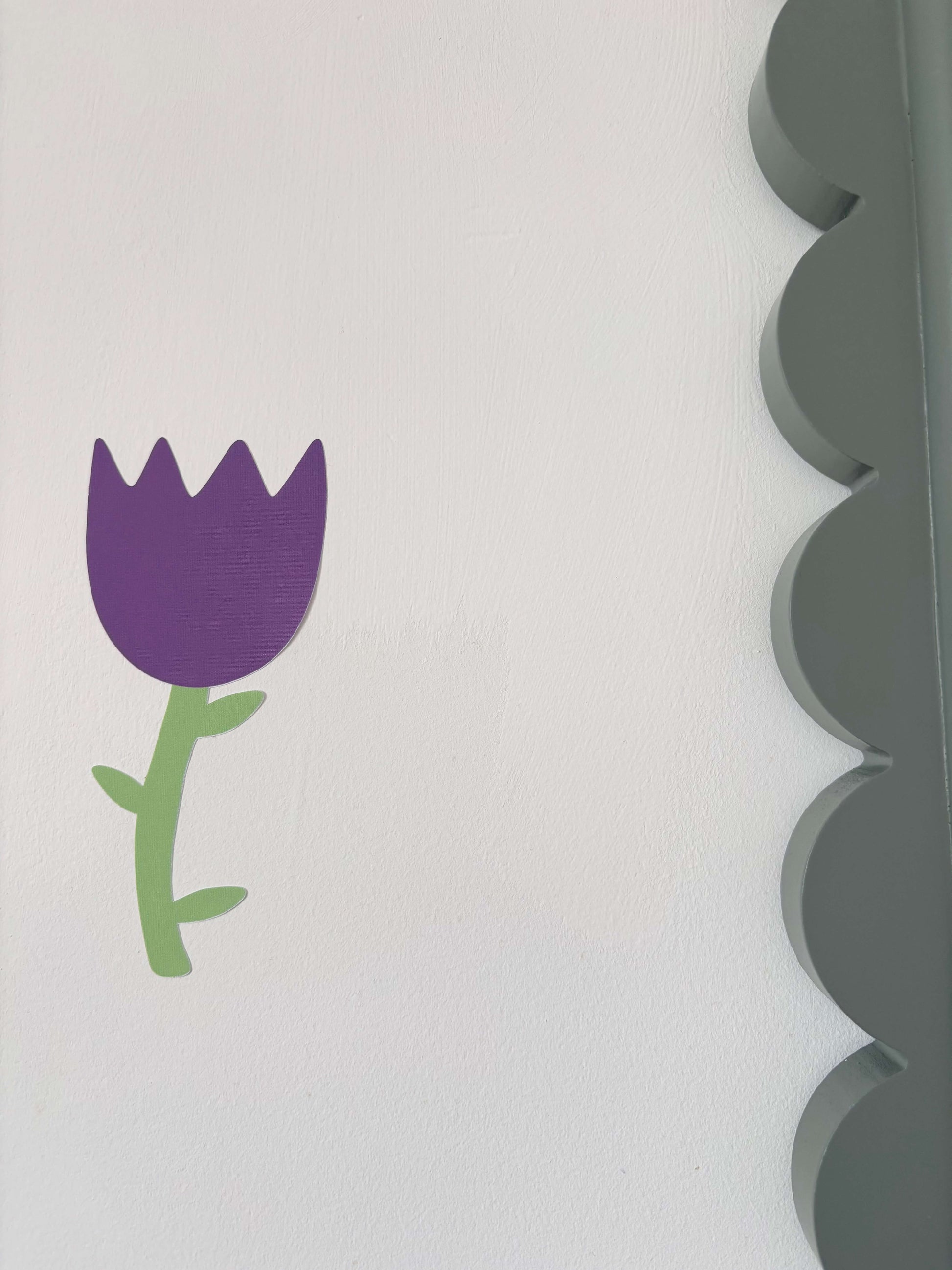 A purple tulip flower wall decal.
