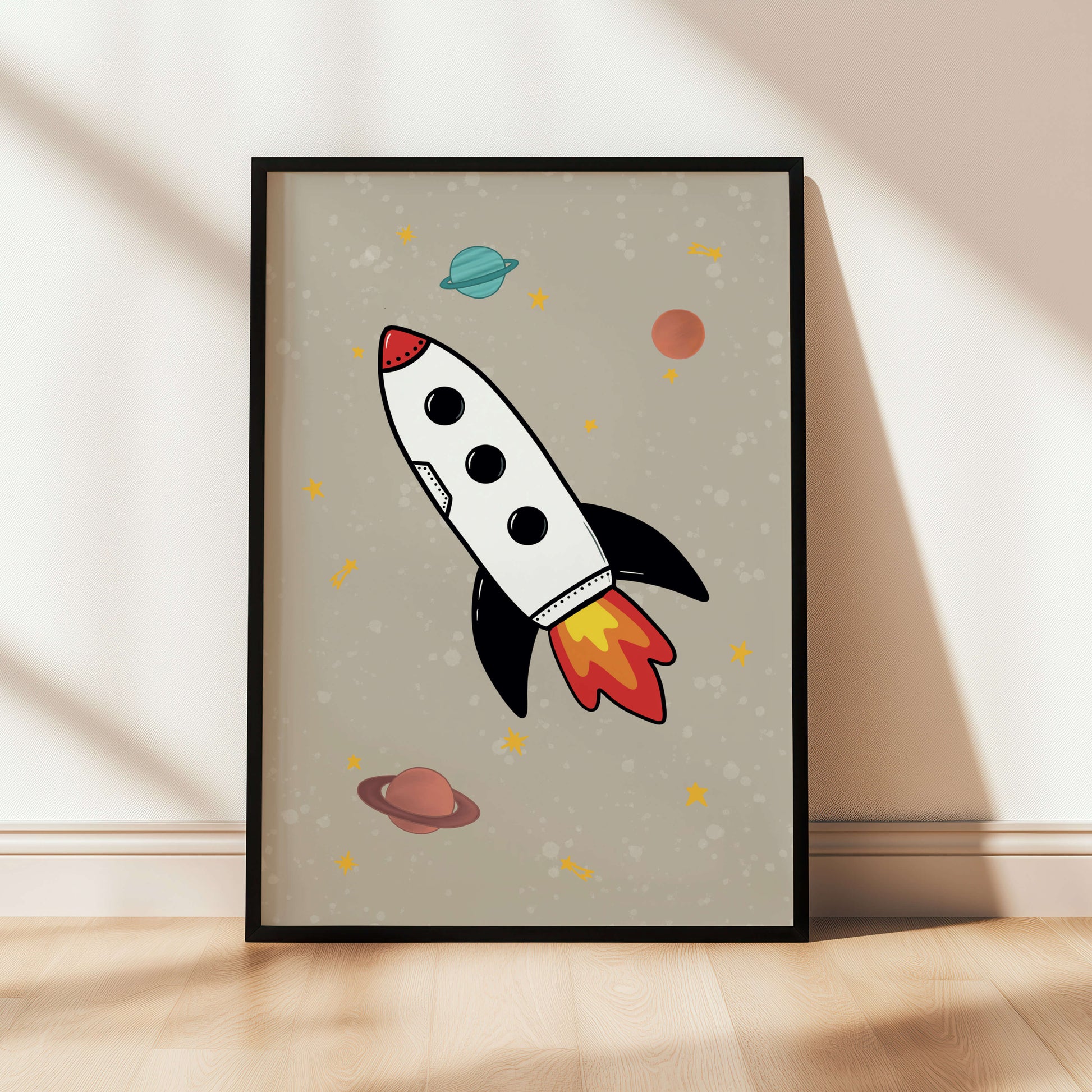 Framed kids' illustration of a rocket ship with stars and planets.