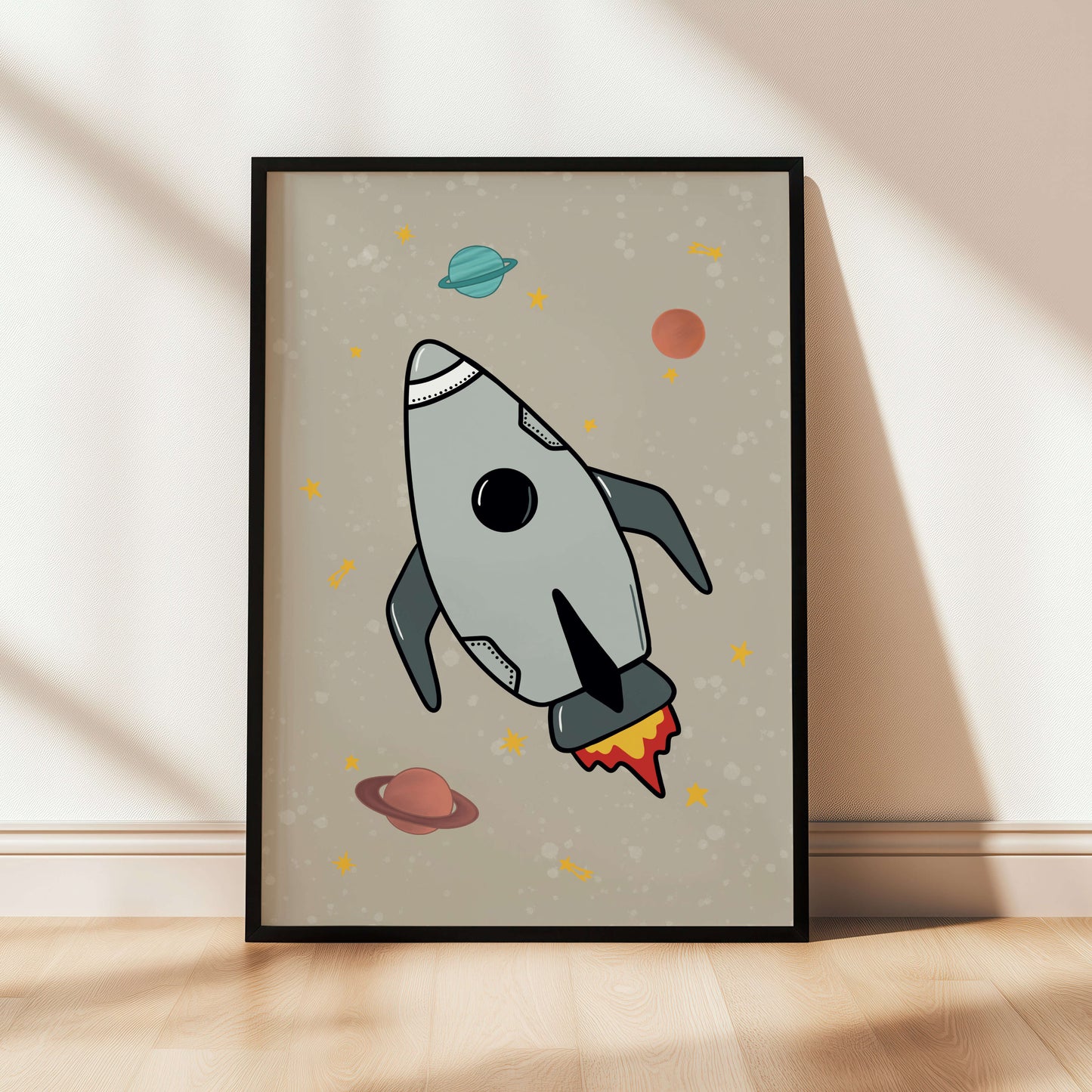 Framed artwork of a rocket ship with planets on a beige background