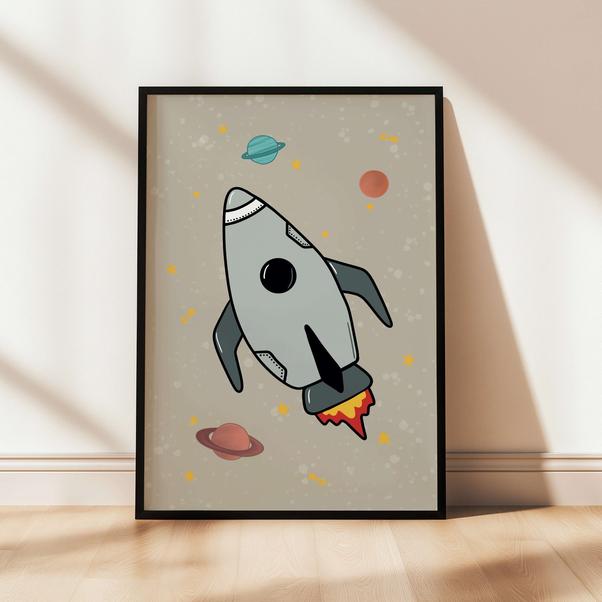 Framed artwork of a rocket ship with planets on a beige background