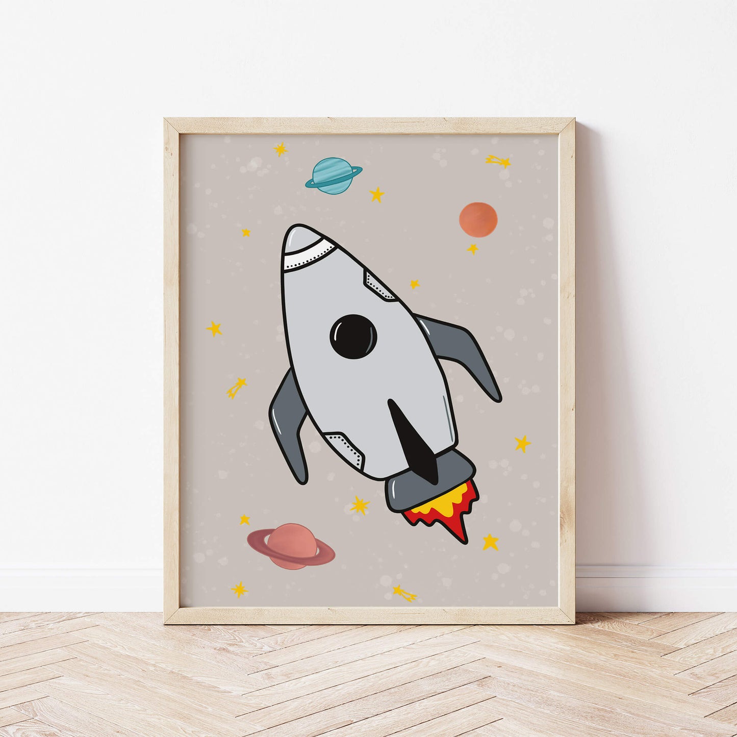 Framed artwork of a rocket ship with planets on a natural coloured background