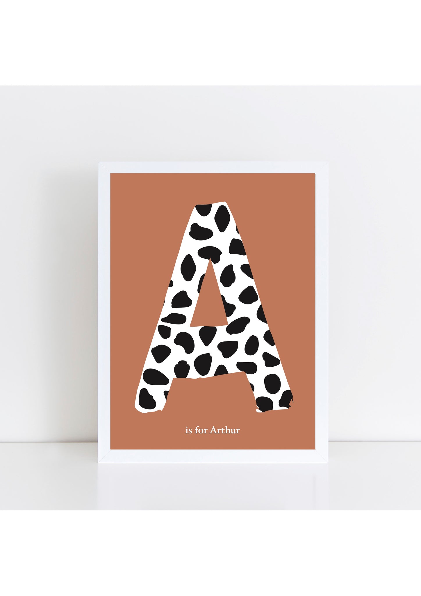 Dalmatian Spot Initial Print - rust background