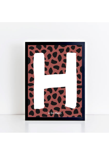 Dalmatian Spot Initial Print - brick/black background