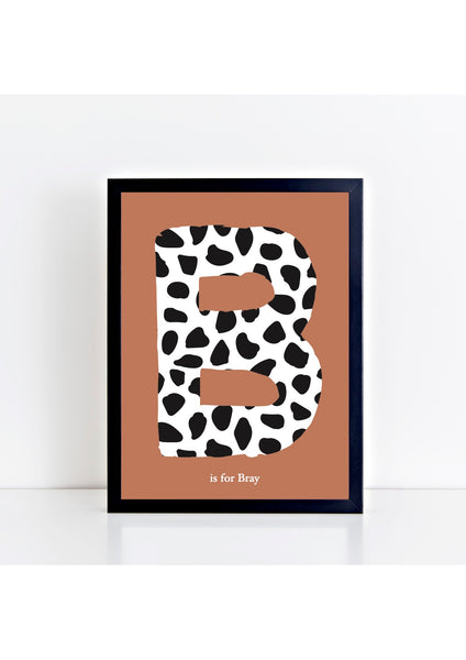 Dalmatian Spot Initial Print - rust background